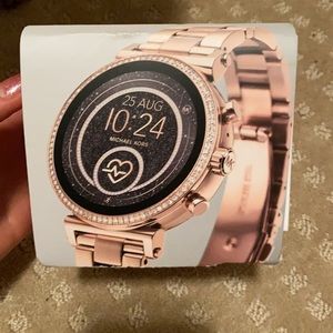 Rose gold Michael Kors smart watch